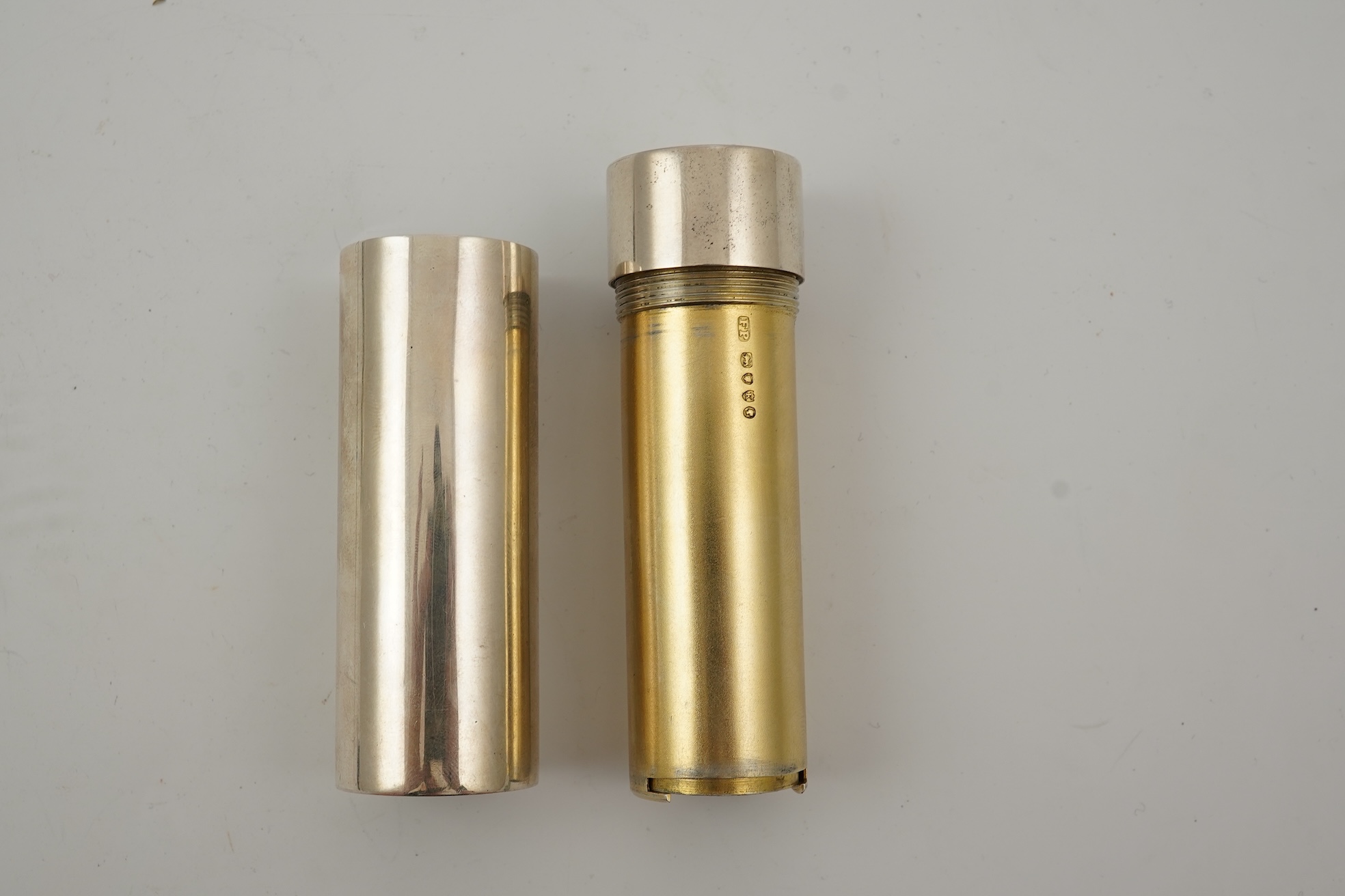 A late Victorian parcel gilt silver tubular coin holder, by Frederic Purnell